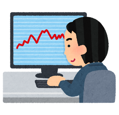 男性が株価をみている